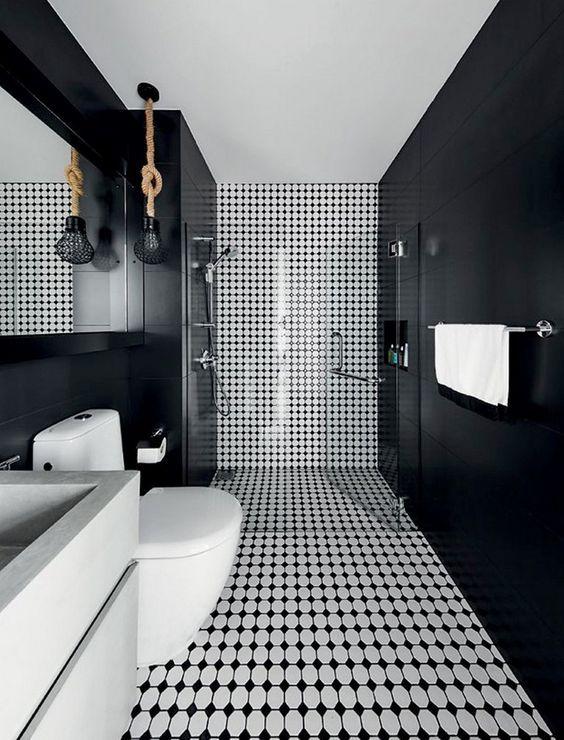 banheiro preto e branco com azulejo metrô