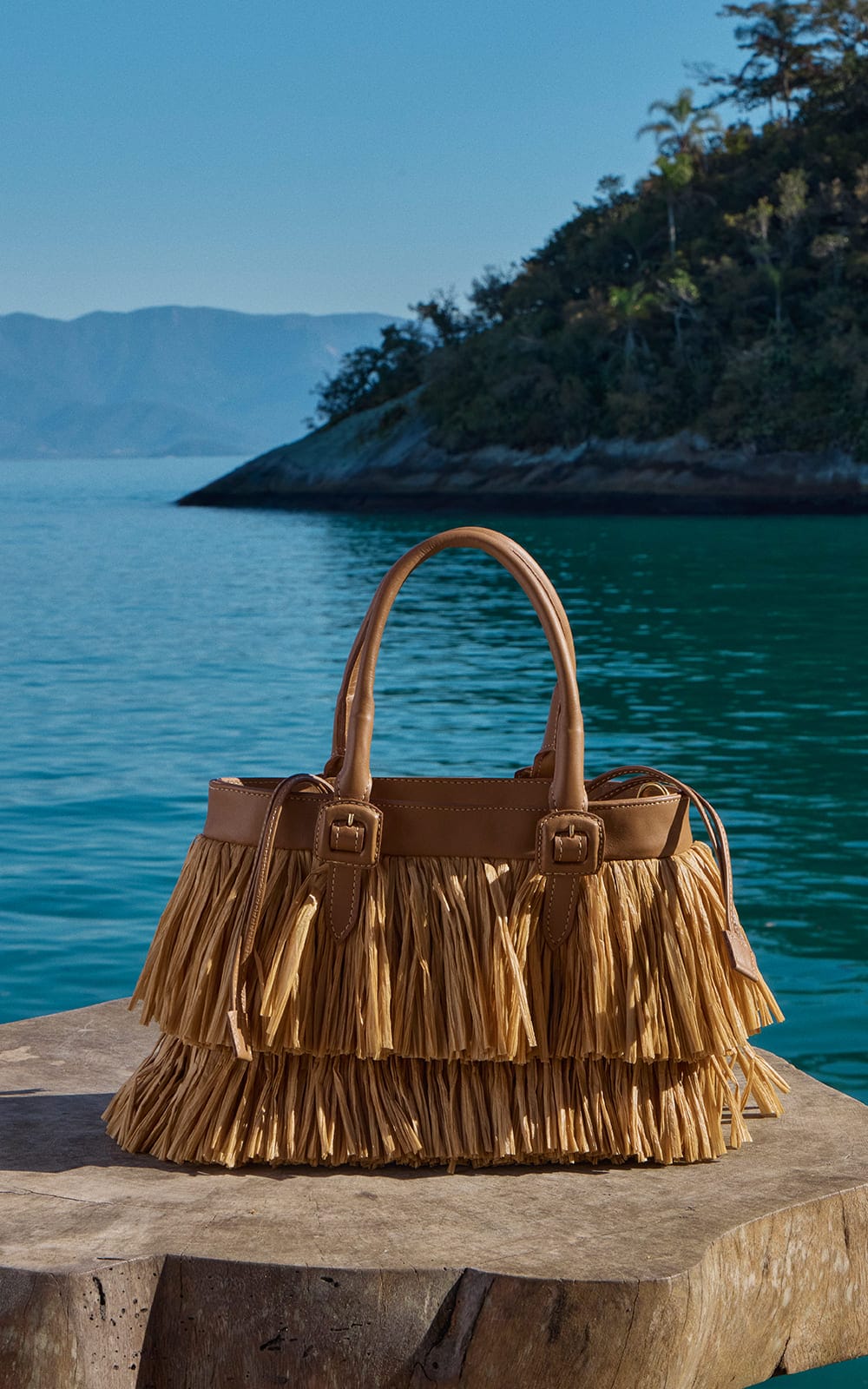 Bolsa de crochê com franja clutch