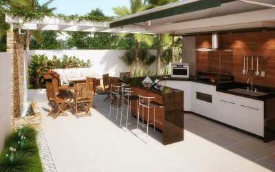 fachada de casa com área gourmet na frente