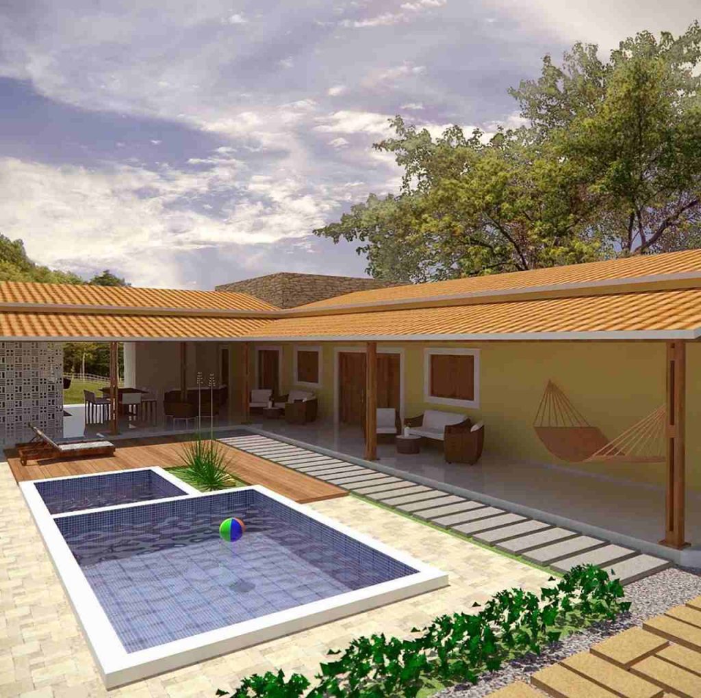 Casa em L para terrenos de fundo