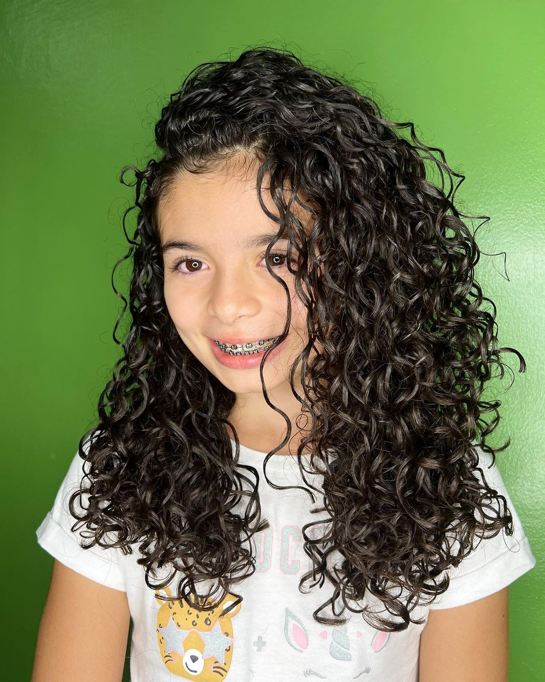 corte infantil cacheado feminino com franja
