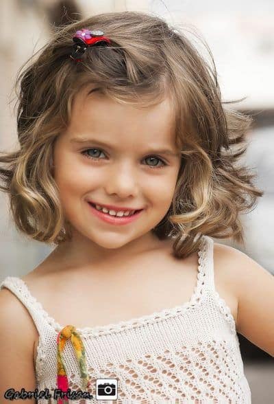 corte infantil cacheado feminino em camadas