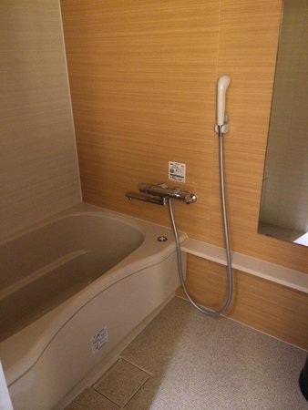 Materiais Naturais: Como Integrar Madeira e Pedra na Decoração Japonesa de Banheiros