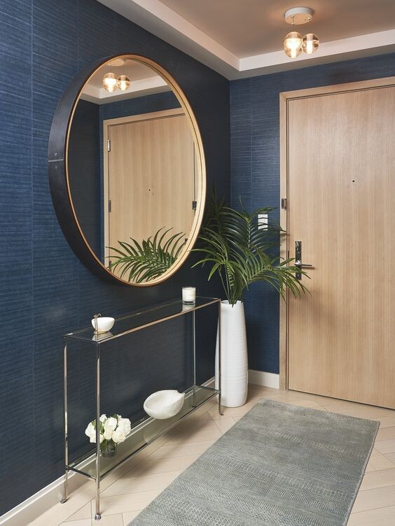 espelho na porta de entrada