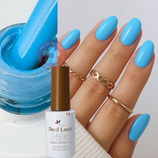 unha em gel azul com adesivo