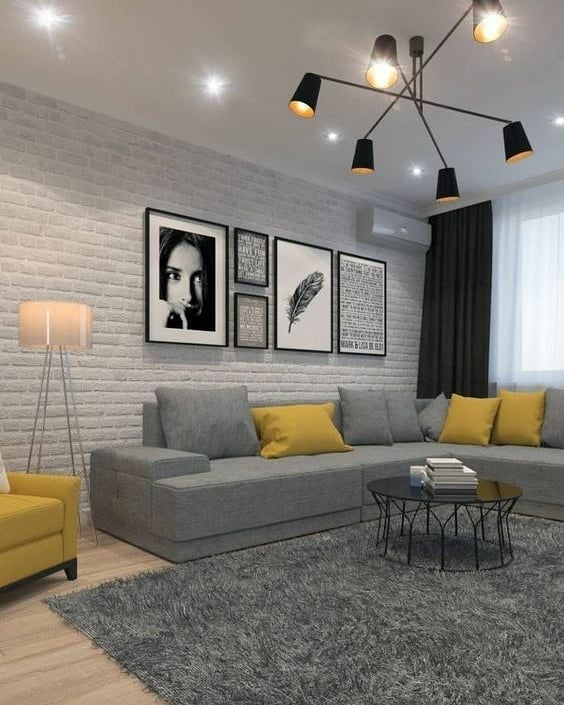 Como usar plantas para trazer vida à decoração com sofá cinza