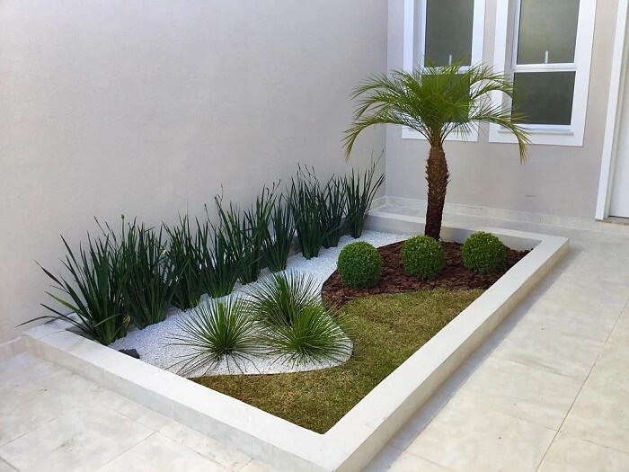 jardim com pedras brancas