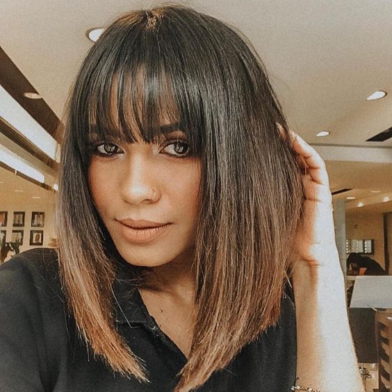 long bob com franja rosto redondo