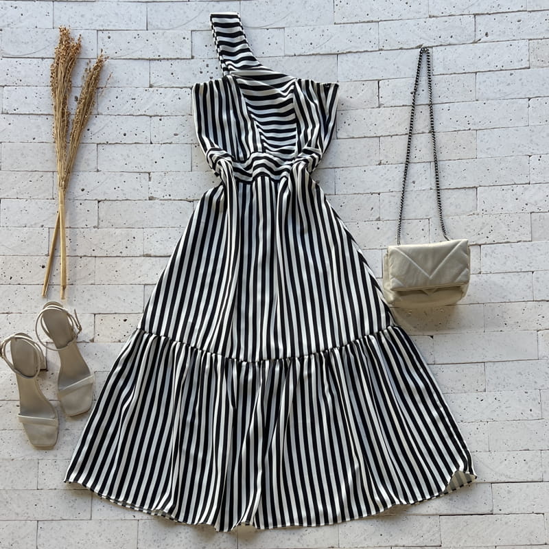 Mix de Estampas: Ousadia com Vestido Listrado