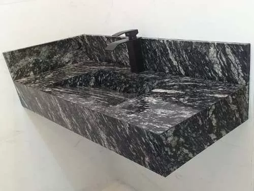 pia esculpida em granito