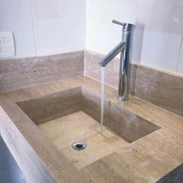 pia esculpida em granito