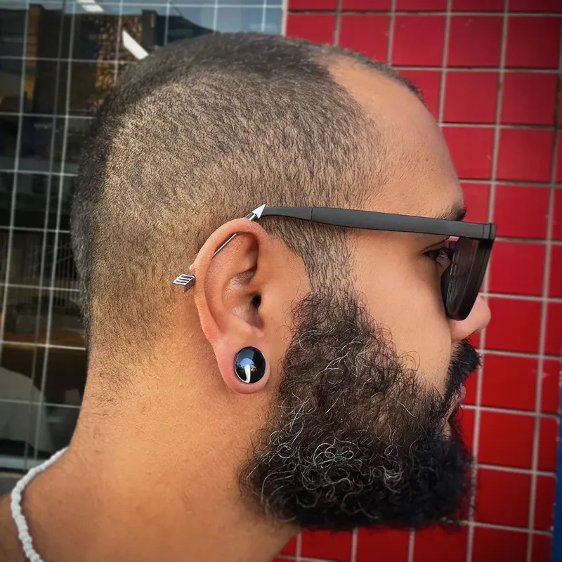 Inspiração piercing orelha homem