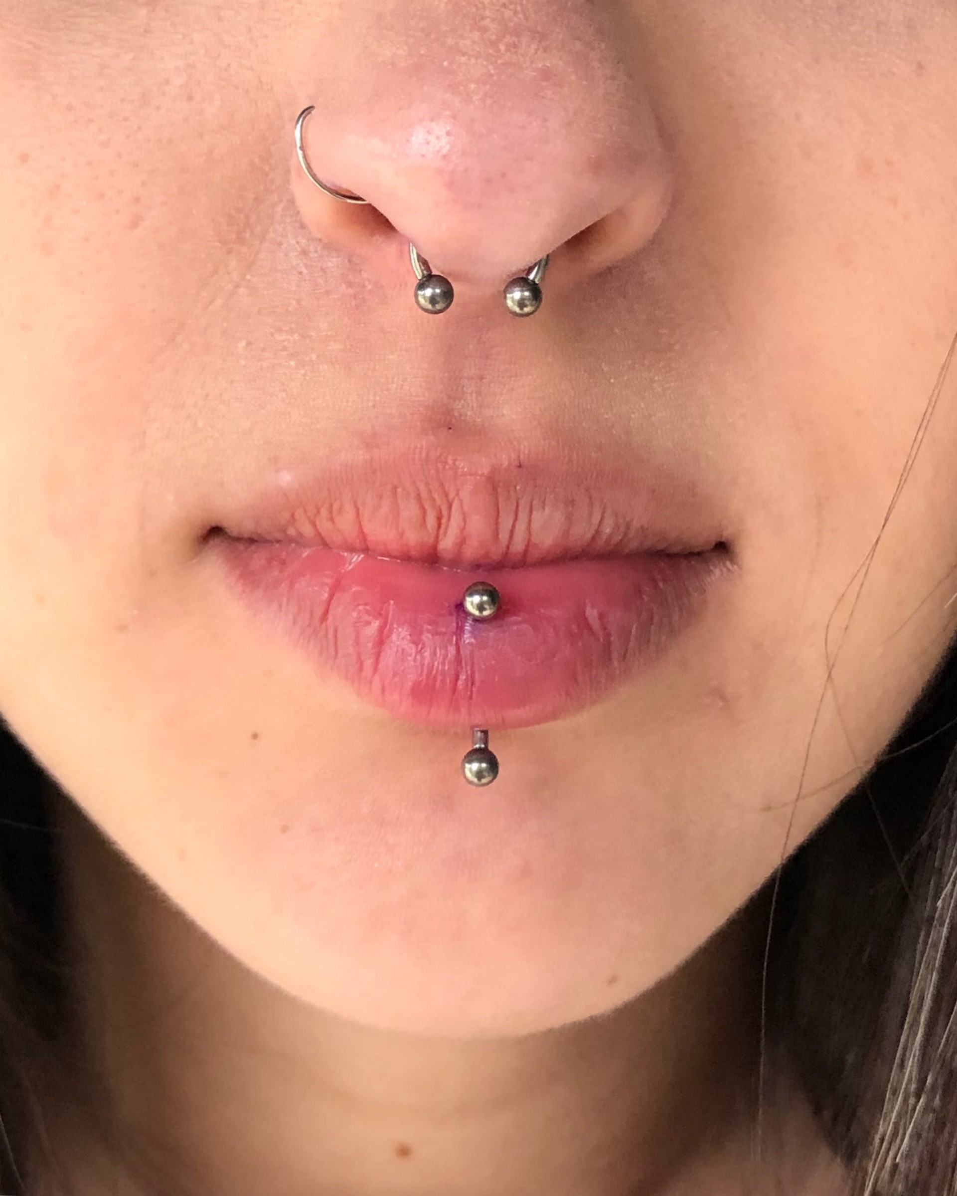 Piercing smile