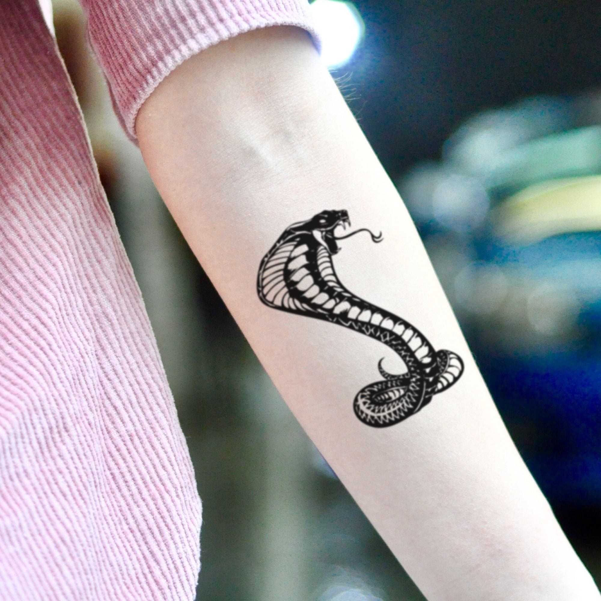 Significado da Tatuagem de Cobra no Braço