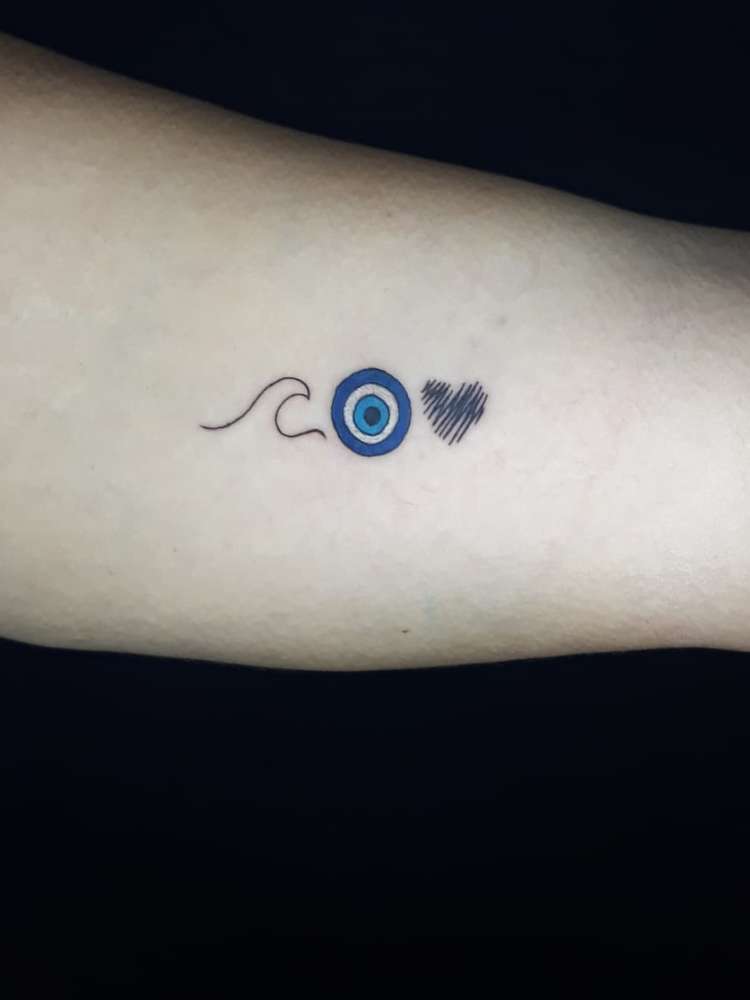 Onde fazer sua tatuagem de olho grego: guia completo