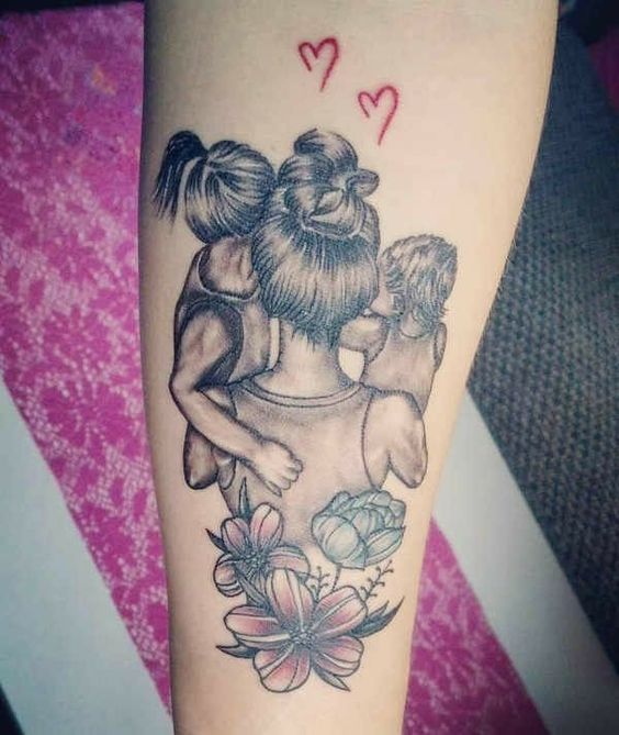 tatuagem casal com símbolos filhos