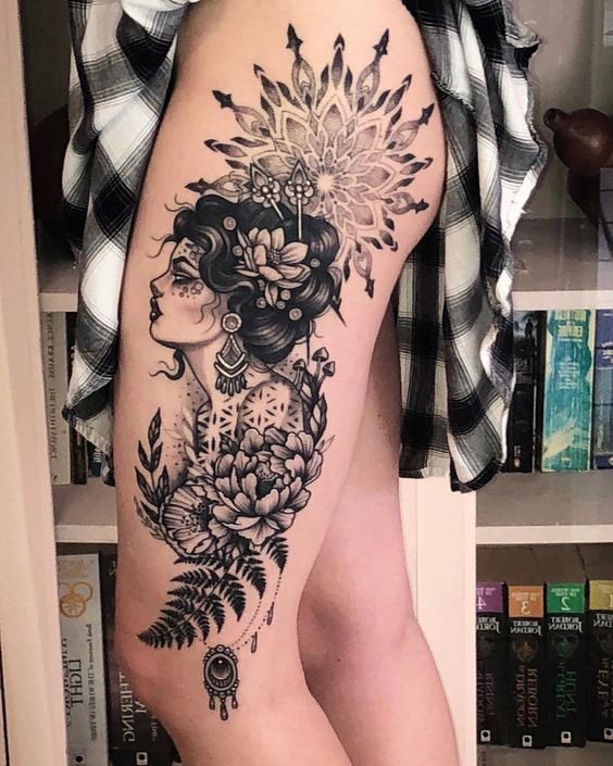 tatuagem catrina na coxa feminina