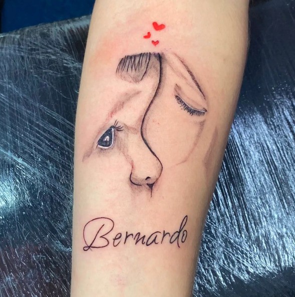 tatuagem com nome de filho para pais