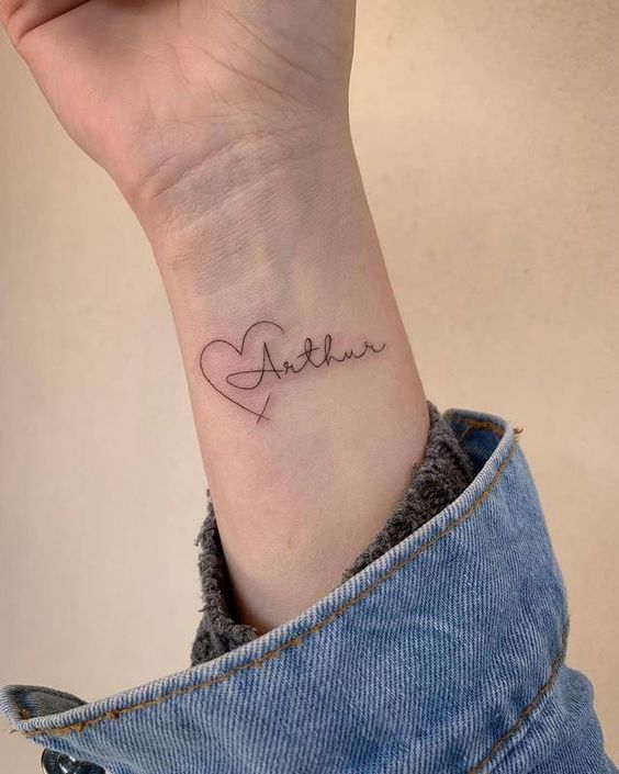 tatuagem com nome de filho delicada