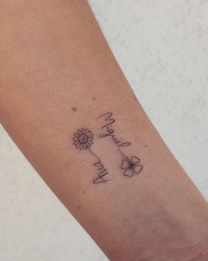 tatuagem com nome de filho e coração
