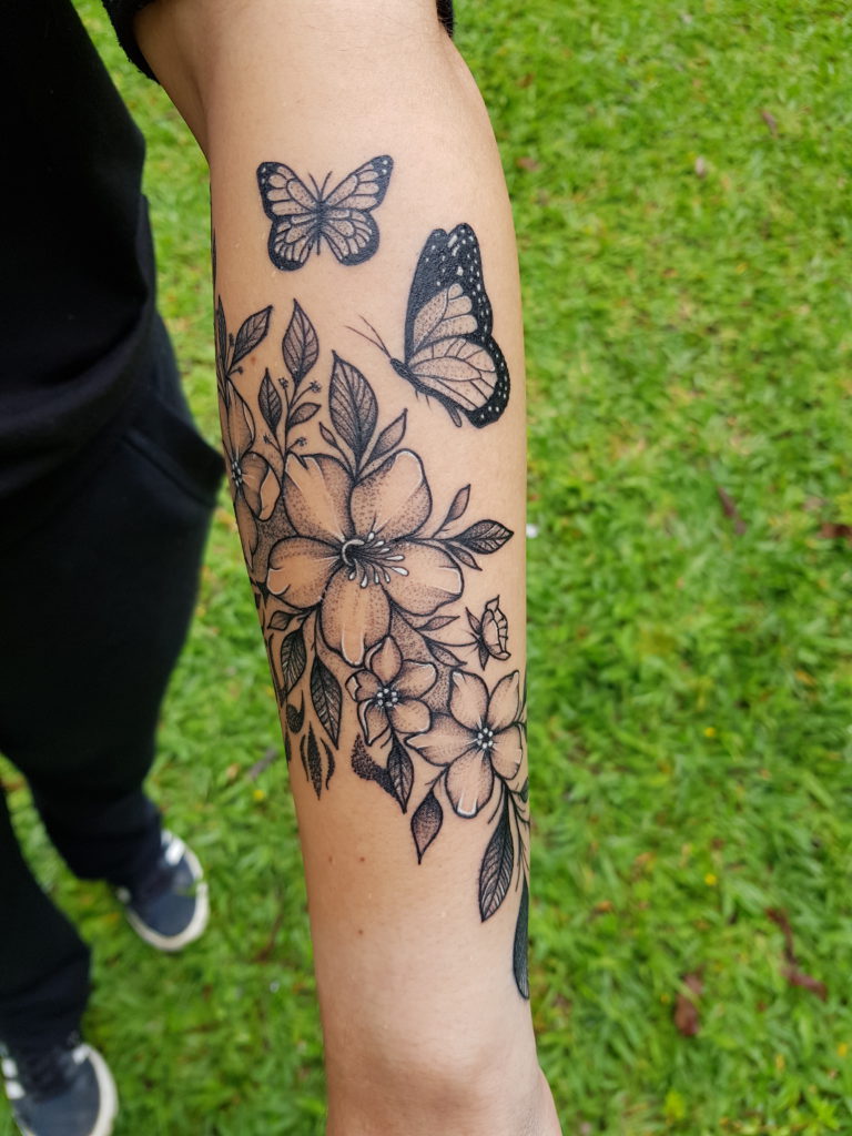 tatuagem de braço feminina