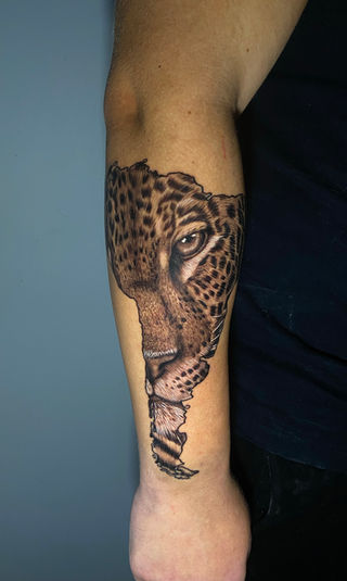 Guia Completo de Estilos para sua Tatuagem de Onça Perfeita