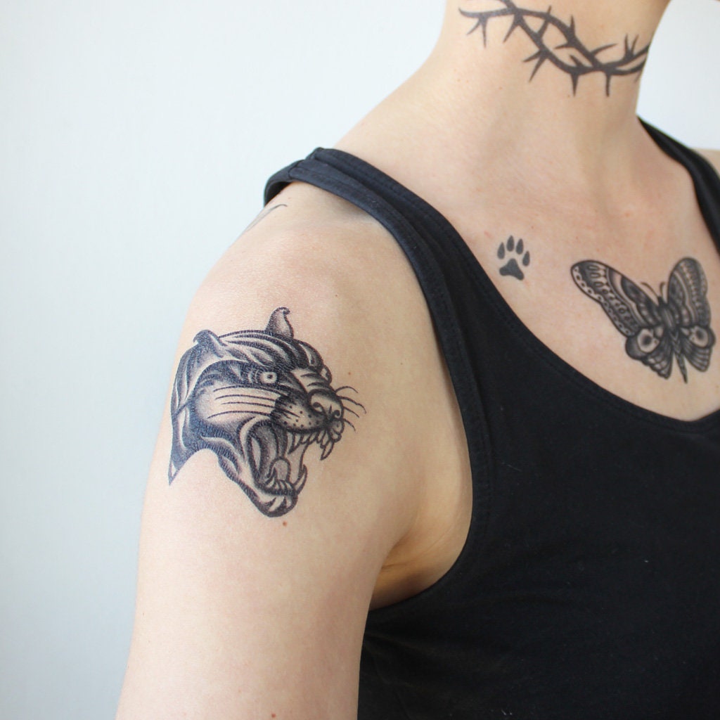 tatuagem pantera realista feminina