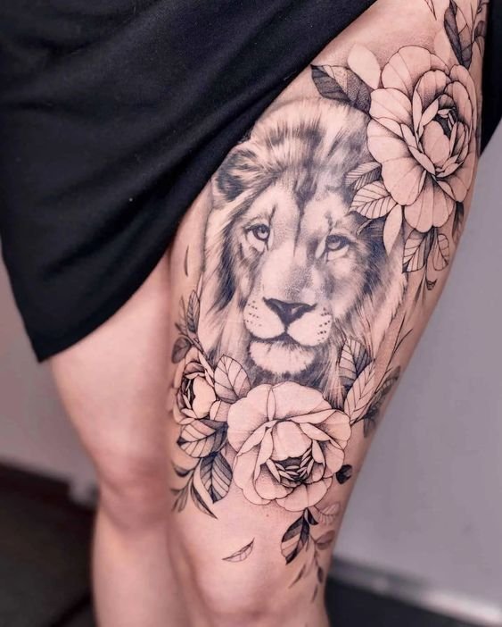 tatuagem feminina na coxa com mandalas