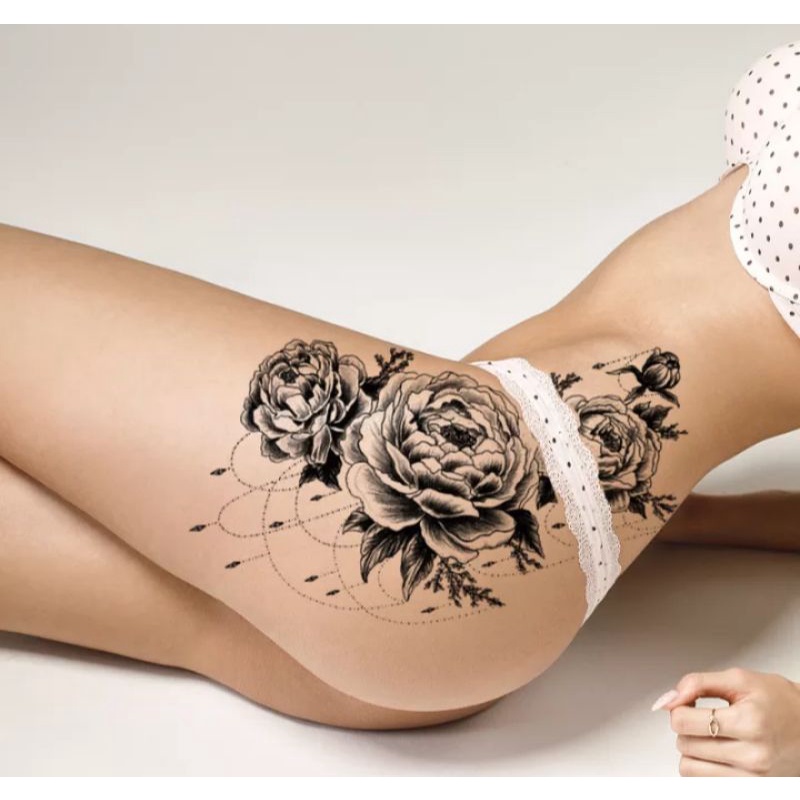 tatuagem feminina na coxa delicada