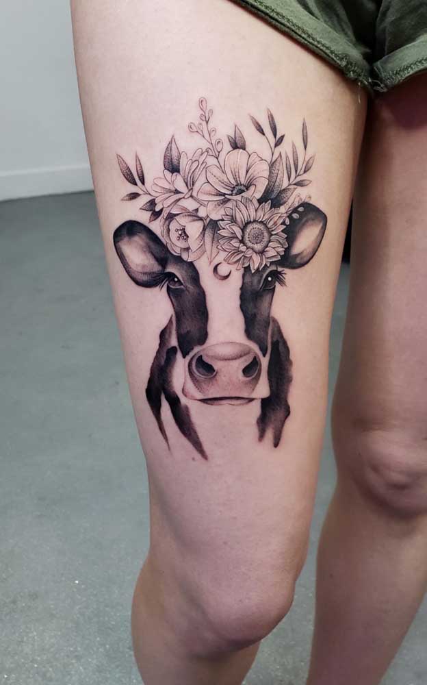 tatuagem feminina na coxa minimalista