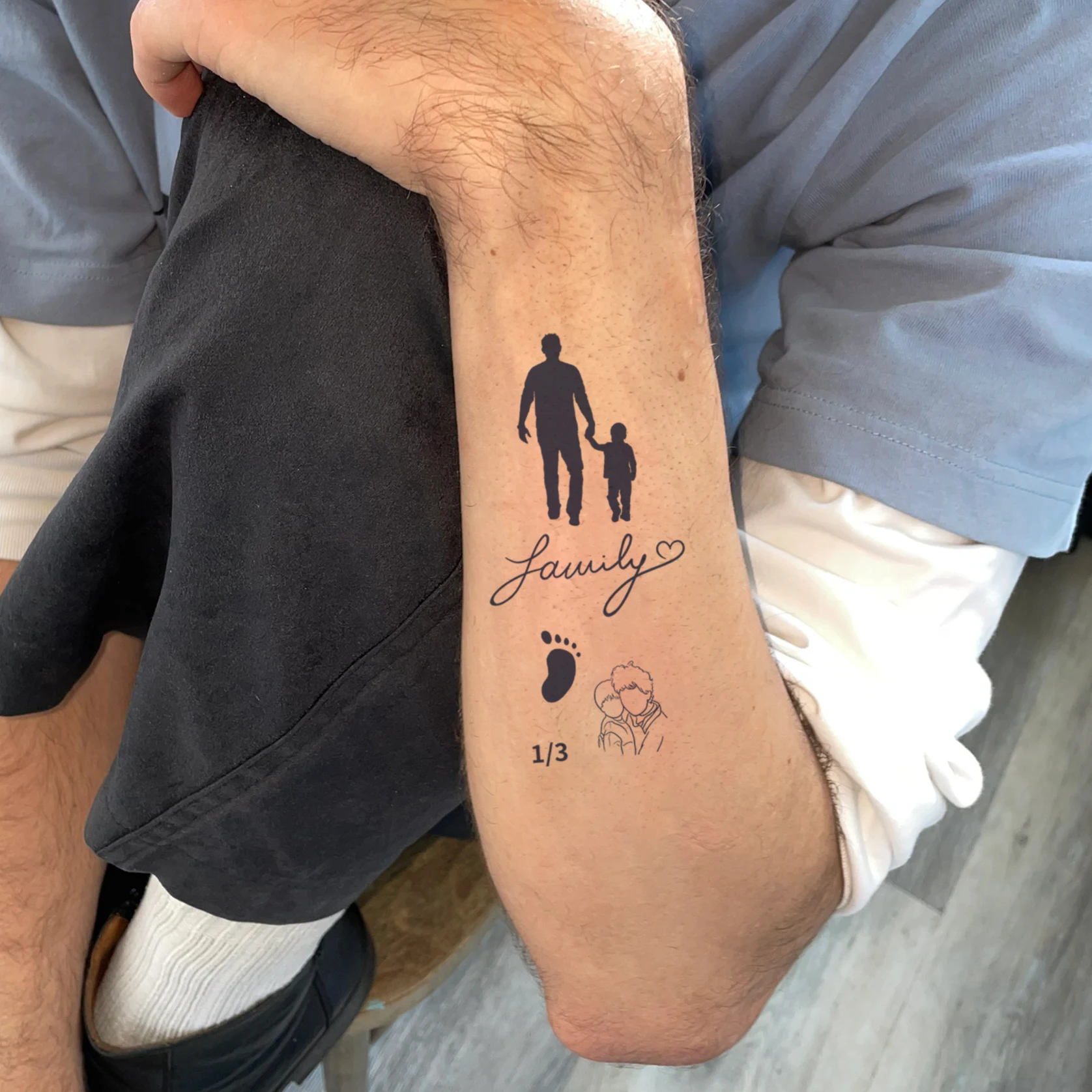 tatuagem pai e filho casal