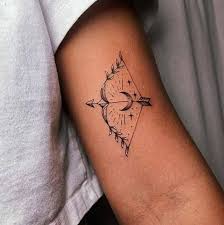 tatuagem sagitário delicada