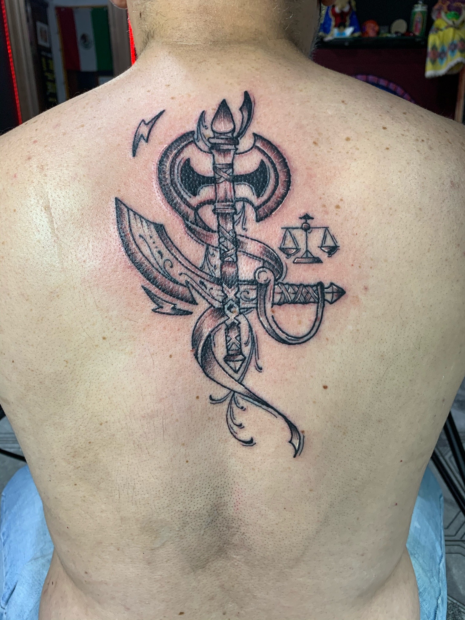tatuagem machado xangô