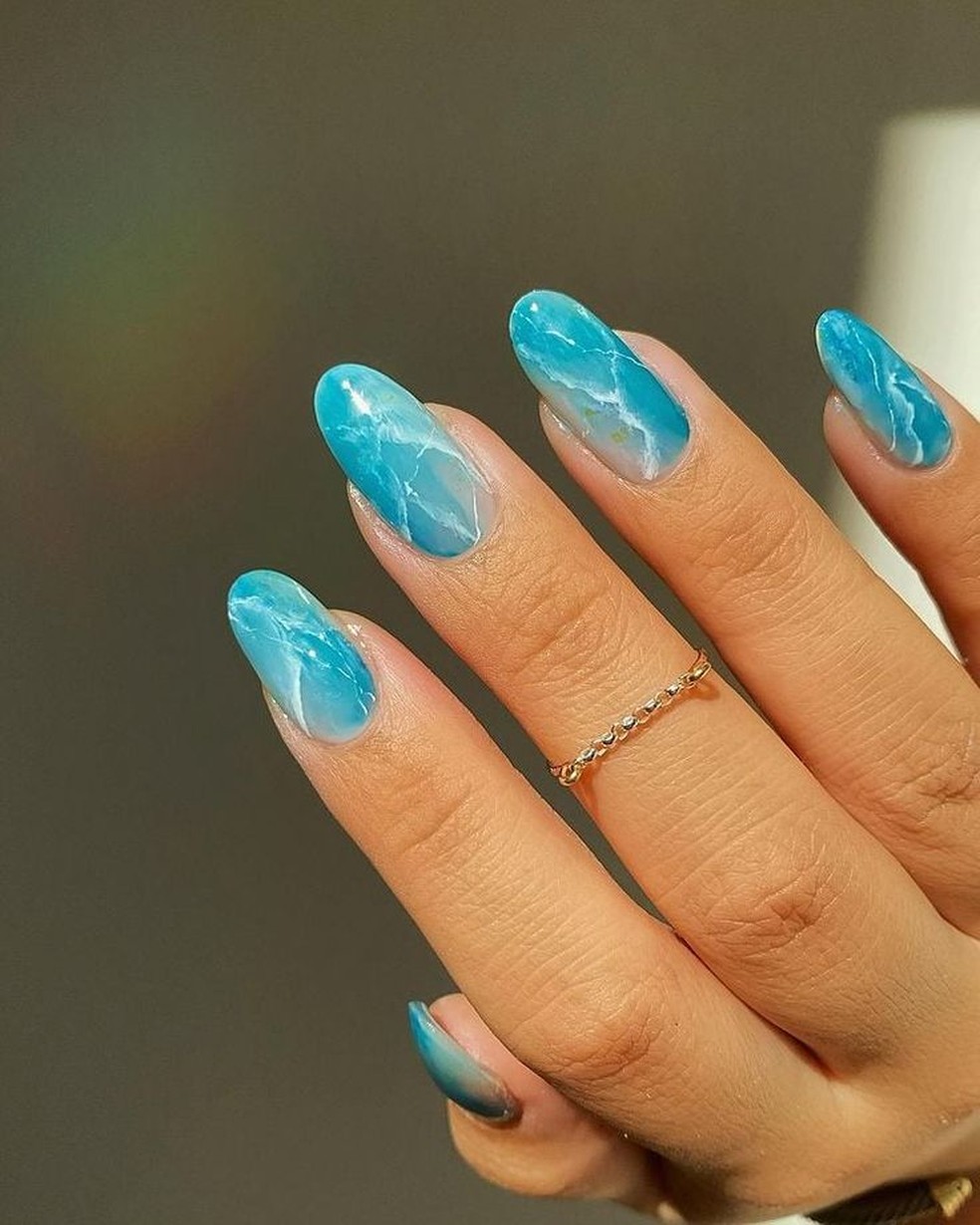 quanto custa fazer unhas decoradas azul claro