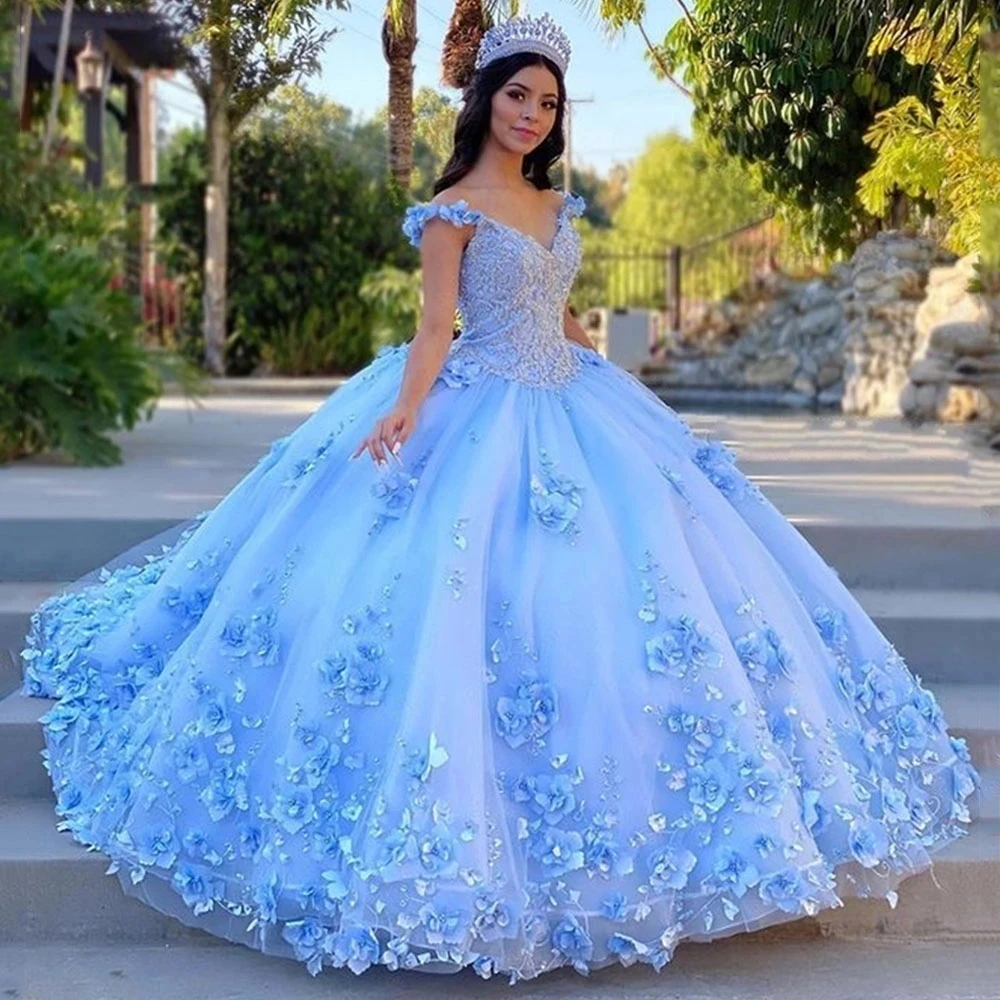 vestido de 15 anos azul claro e dourado