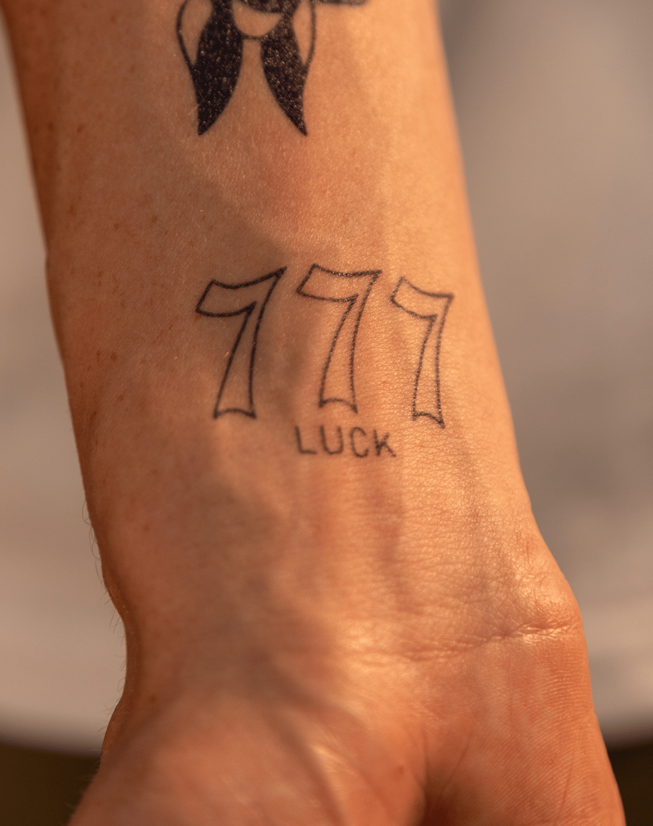 tatuagem 777 prosperidade