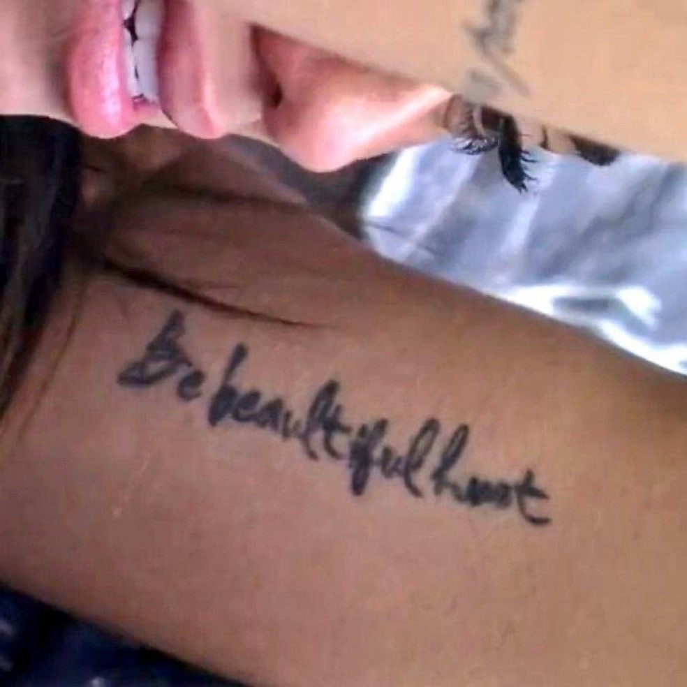 tradução de tatuagem para inglês