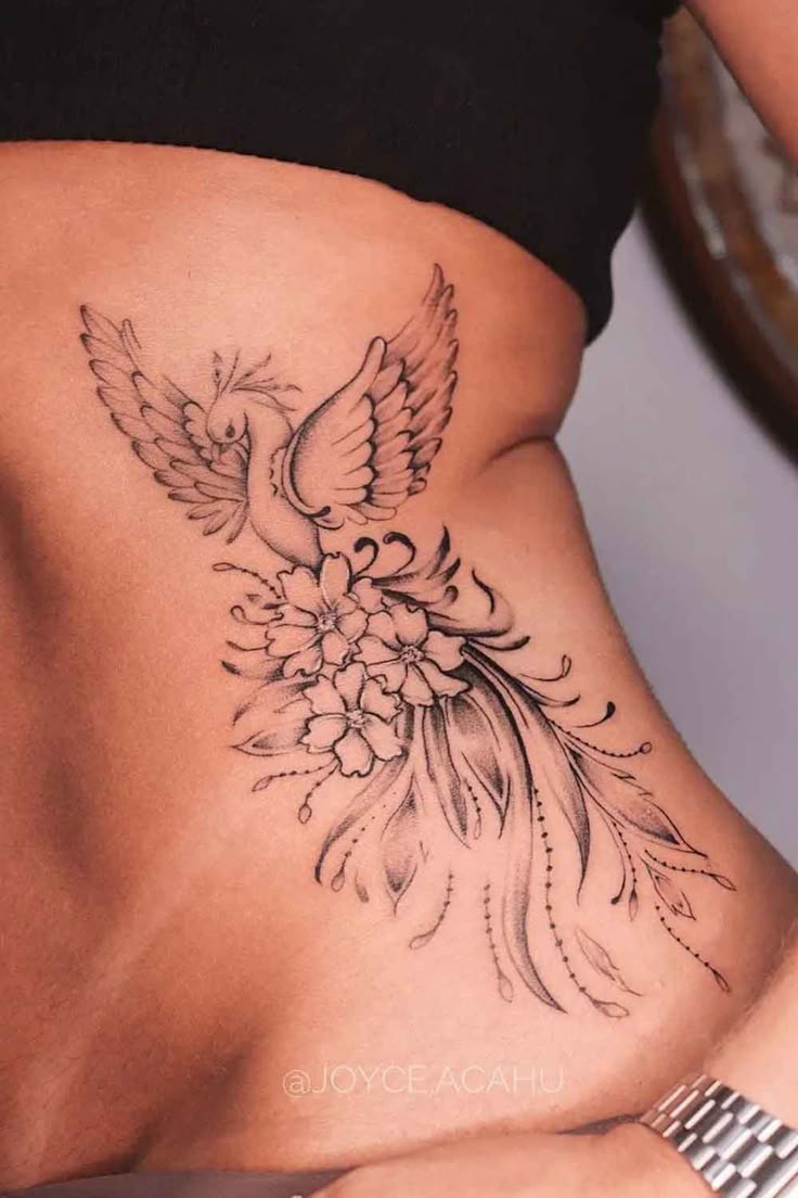 tatuagem fênix costas feminina