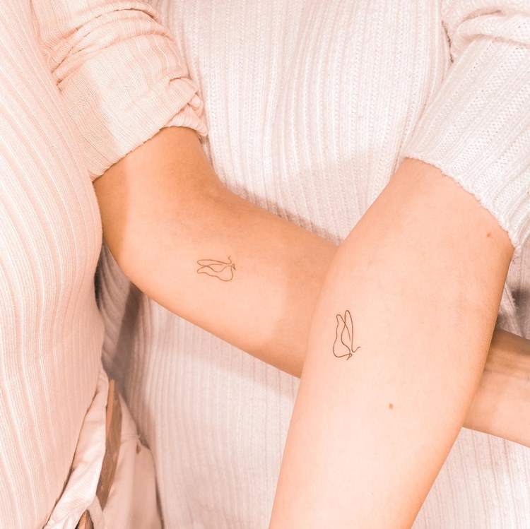 tatuagem símbolo maternidade