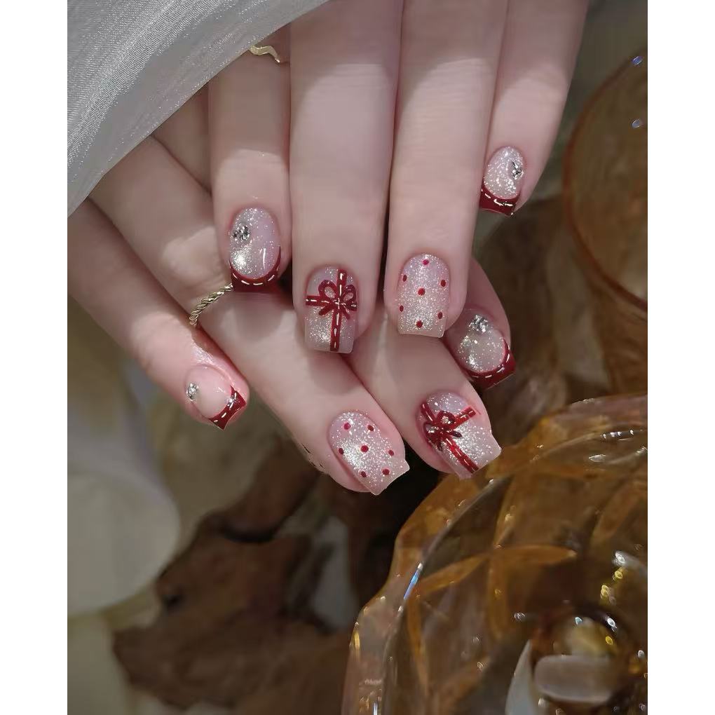 unhas vermelhas com glitter para festa